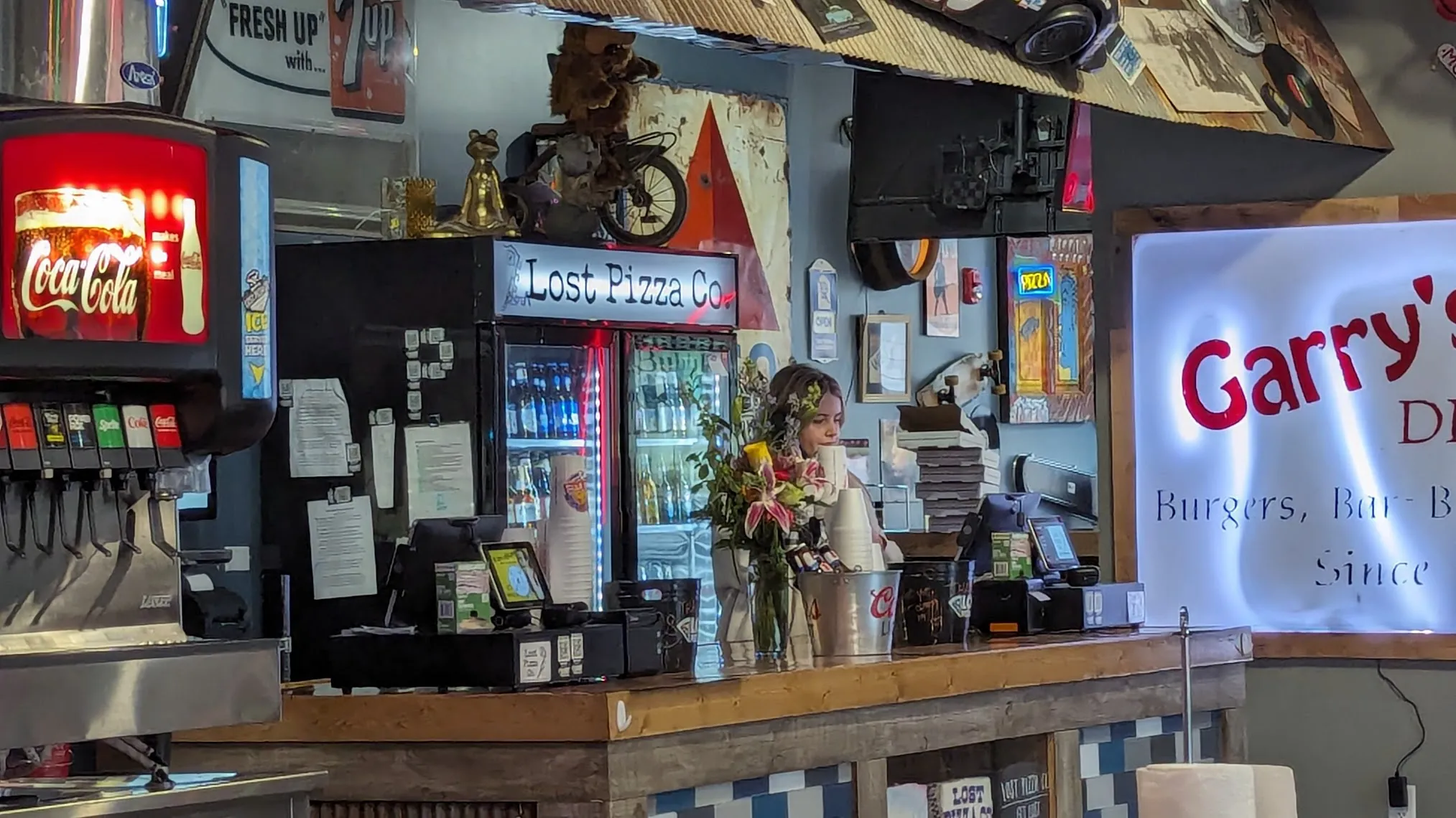 The counter and dining room at Lost Pizza Co. in Cabot, Arkansas